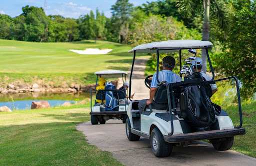 riding a gold cart | master-planned community management