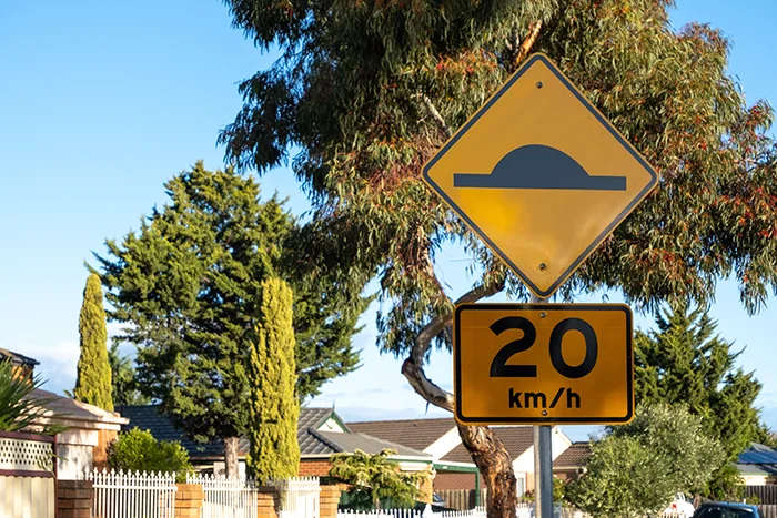 speed bump sign | speed bumps in HOAs