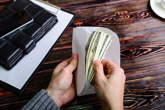 money inside envelope | self-managed hoa