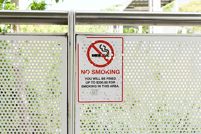 no smoking sign | condo rules violations