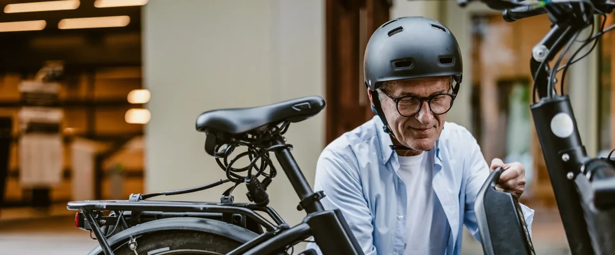 old man using ebike | e-bikes in condos